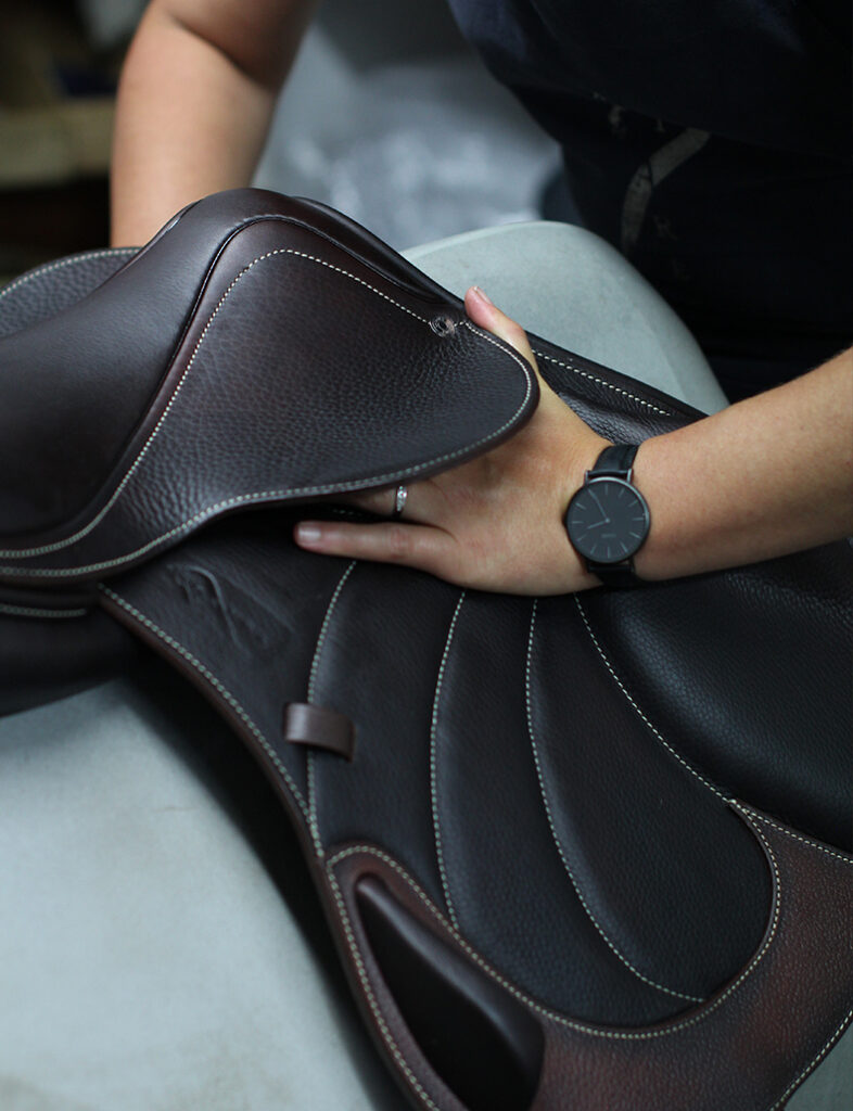 The leather riding saddle is inspected and oiled as soon as it is fully assembled.